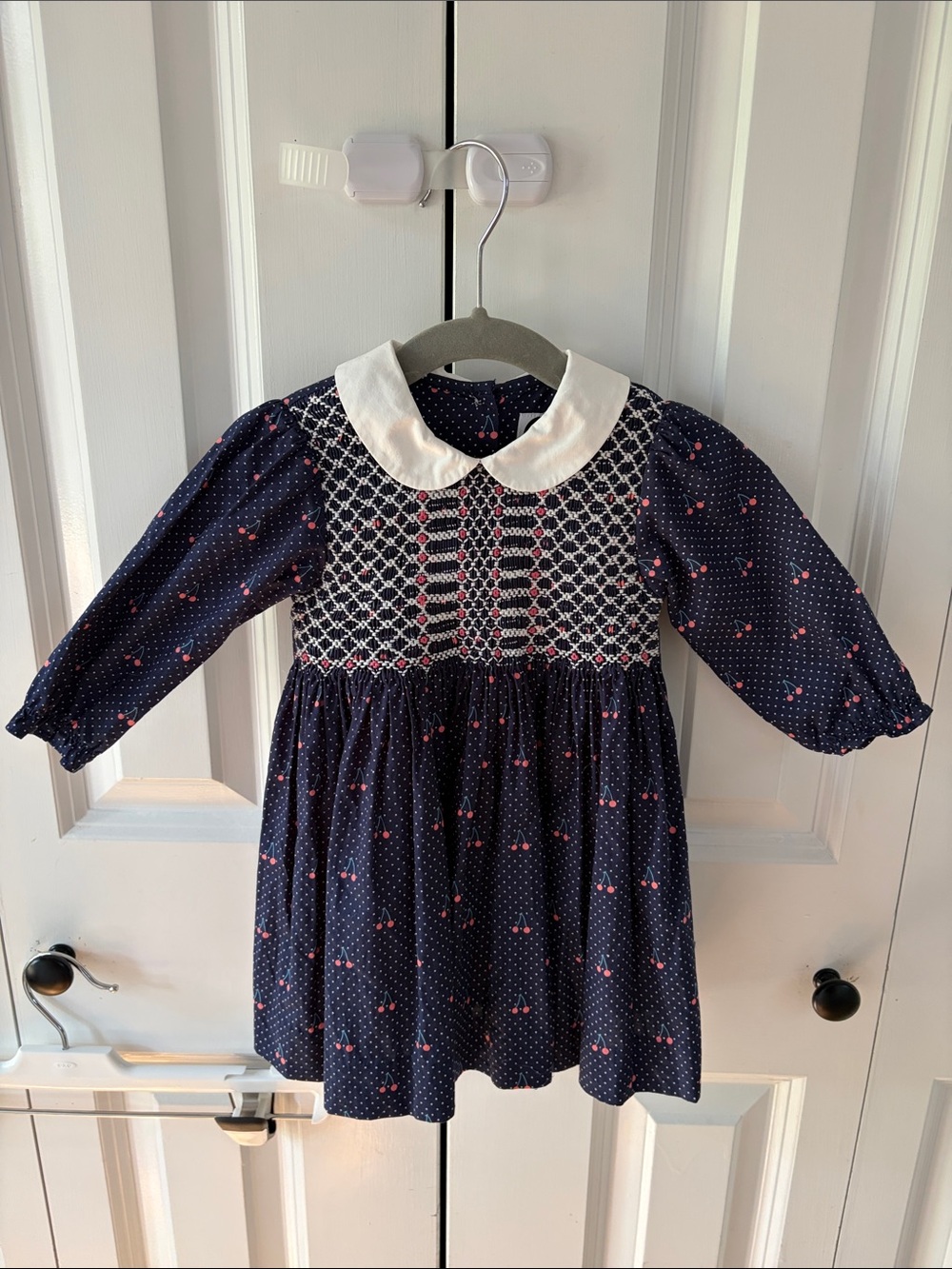 Question Everything Navy Cherry Smocked Girls' Dress with White Peter Pan Collar